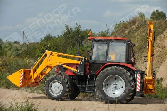 Экскаватор-погрузчик ДЭМ-1143